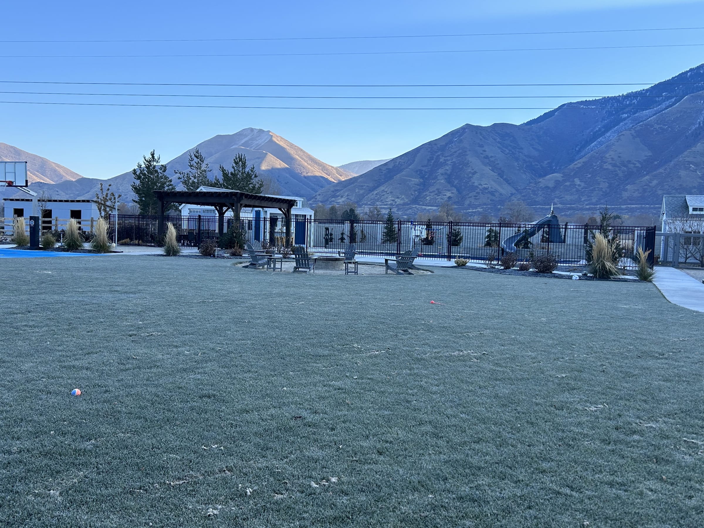 Covered pool and pergola with the Wasatch range behind